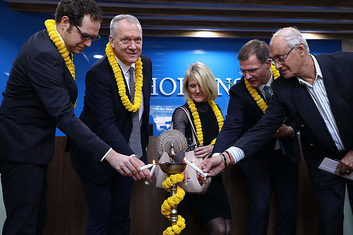 Hohenstein Testing Lab in India - 2019 Grand Opening Hohenstein employees cutting ribbon at lab opening ceremony