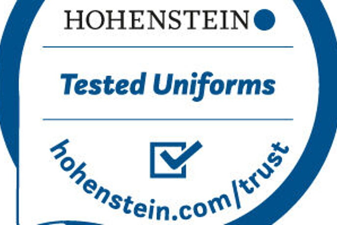 Product label with Hohenstein logo, check mark, and "Tested Uniforms"