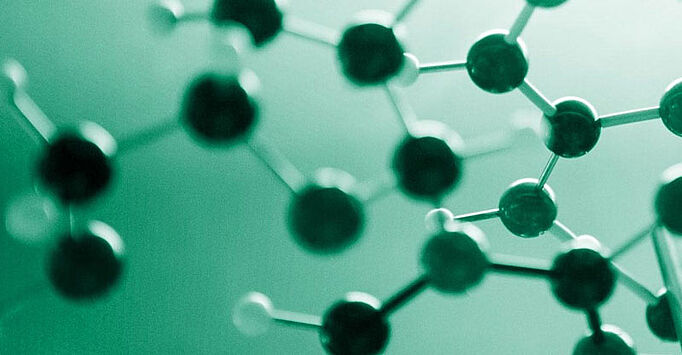 Chemical molecules on green background