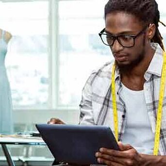 Apparel designer using a tablet