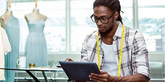 Apparel designer using a tablet