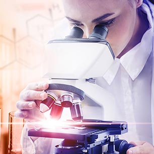Scientist examining biological samples with microscope