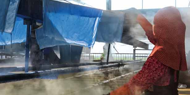 textile worker in dye house