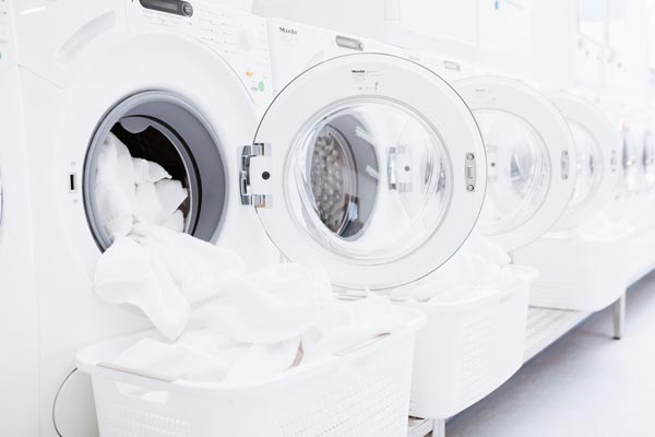 Row of washing machines in Hohenstein Laundry Lab